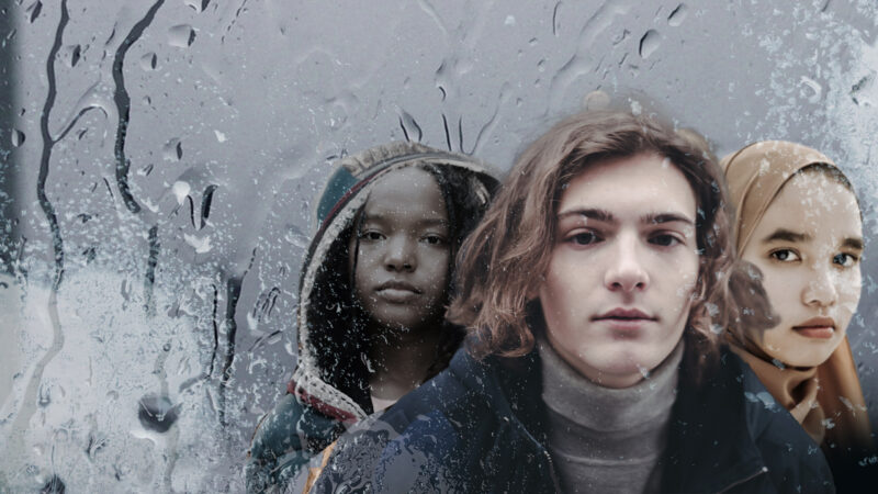 Three young people looking out to camera.